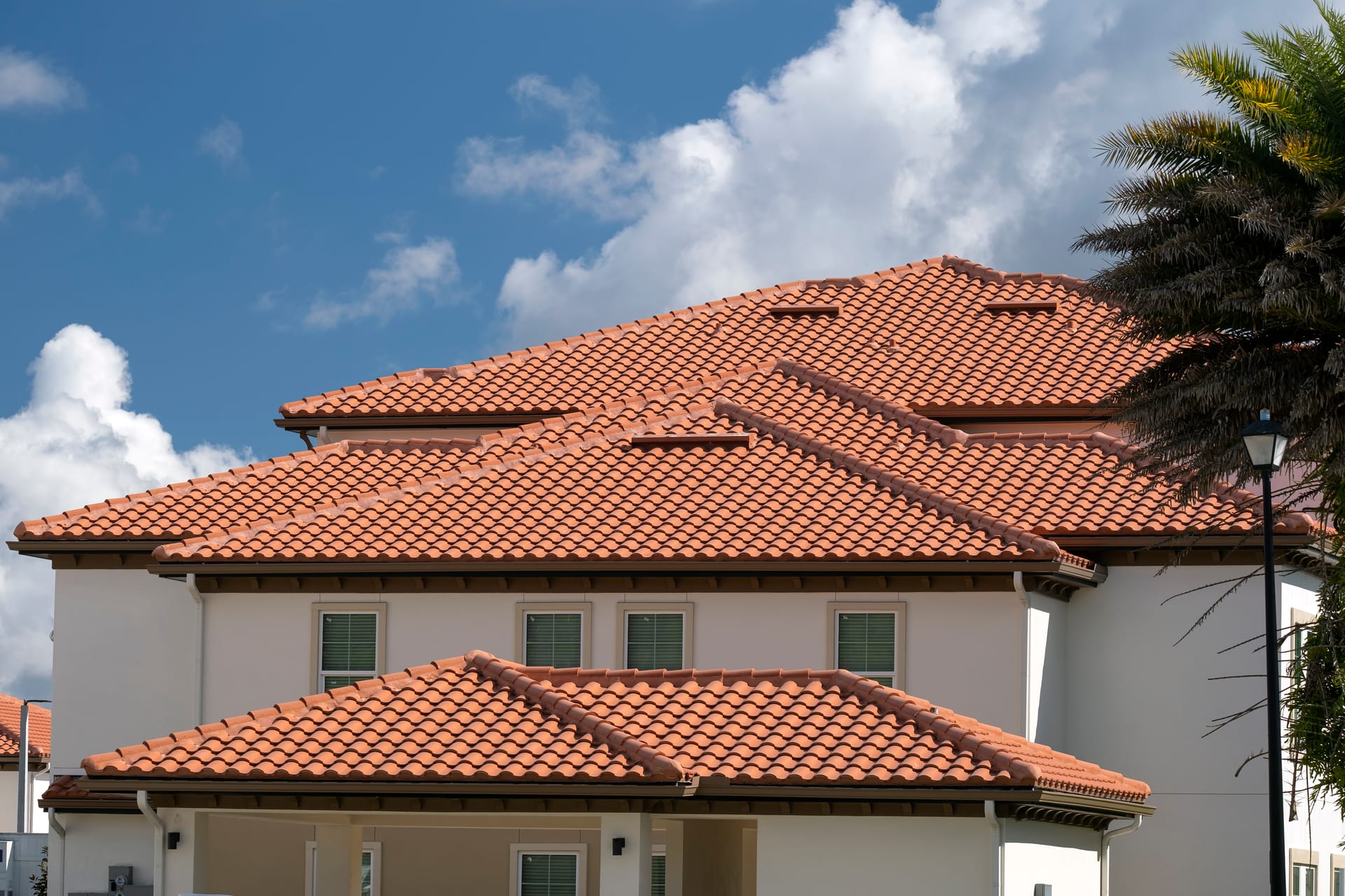 Florida home with a classic terracotta tile roof by Best Florida Roofing